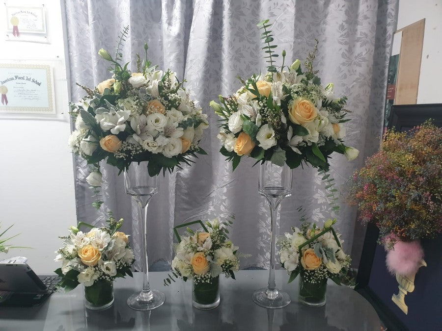 table arrangements for any event decoration using tall glass 